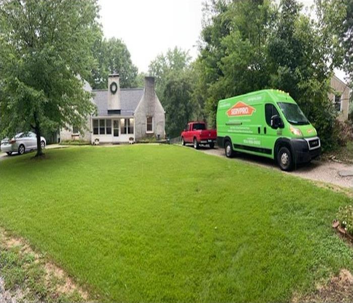 SERVPRO van in front of a home 