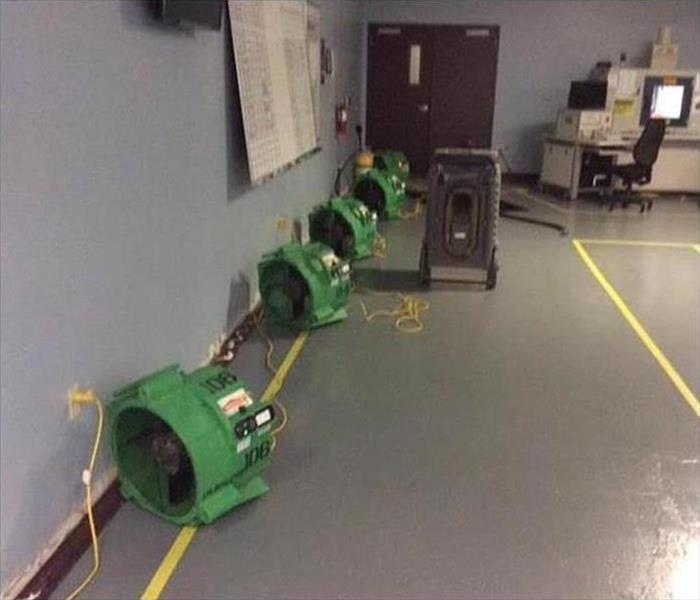 Our air movers drying the flood in this building